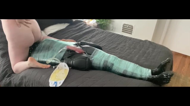 乳胶与导管、Estim和面部固定结合